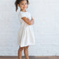 Noukie's Dresses + Skirts White organic cotton knit dress