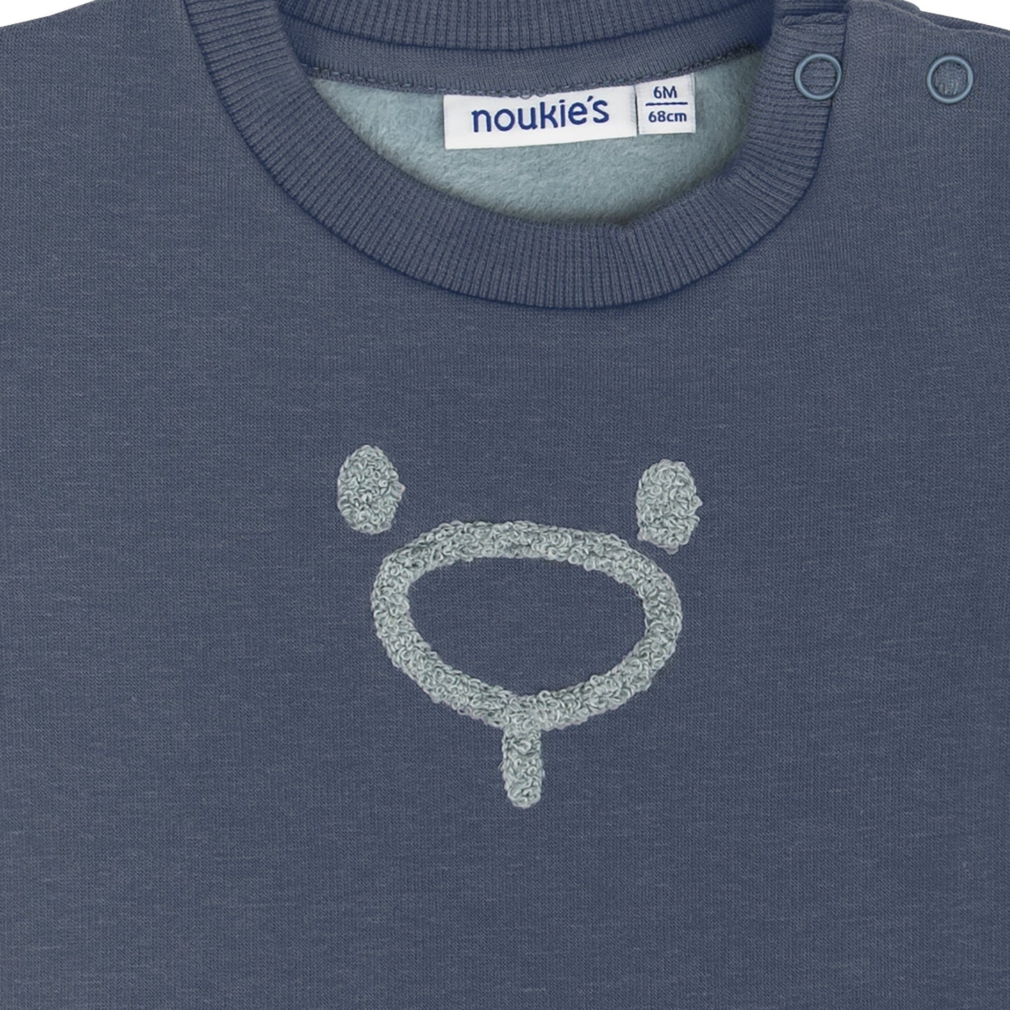 Noukie's Tops Blue sweatshirt with teddy embroidery